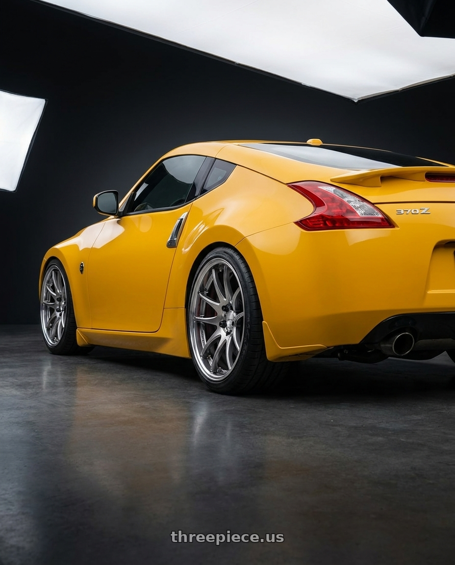 2017 Nissan 370z with Work Cr 2P 5x114.3 19x9.0 +18 GT Silver wheels rear three quarter view square tires
