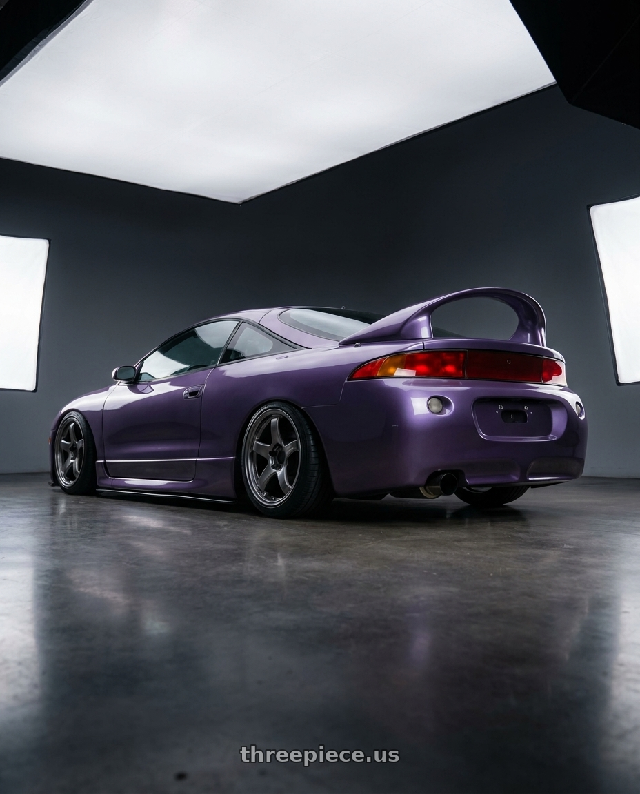 1997 Mitsubishi eclipse with Enkei PF05 5x114.3 18x9.5+38 Dark Silver wheels rear three quarter view square tires