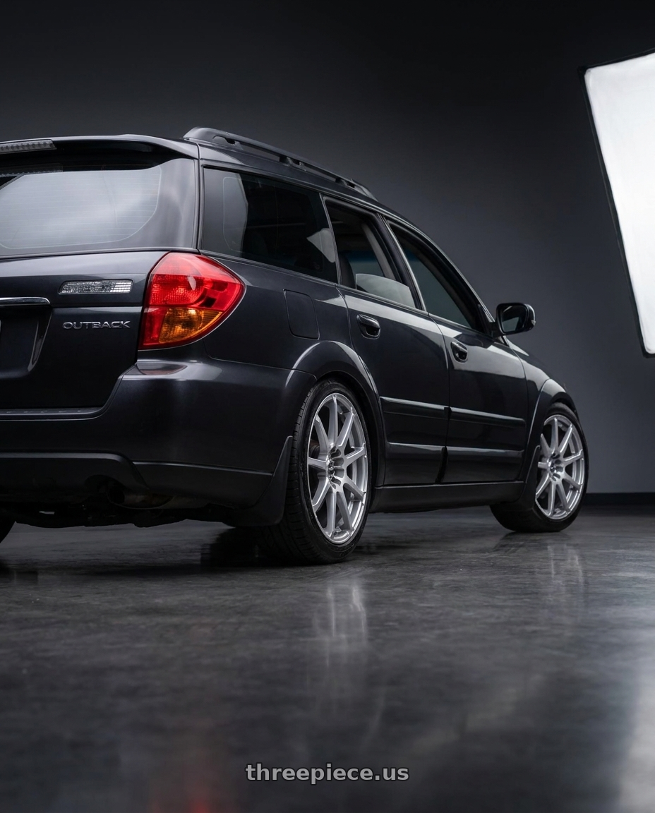 2009 Subaru Outback with Enkei EDR9 5x100/114.3 17x8+45 Silver wheels rear three quarter view slight stretch tires