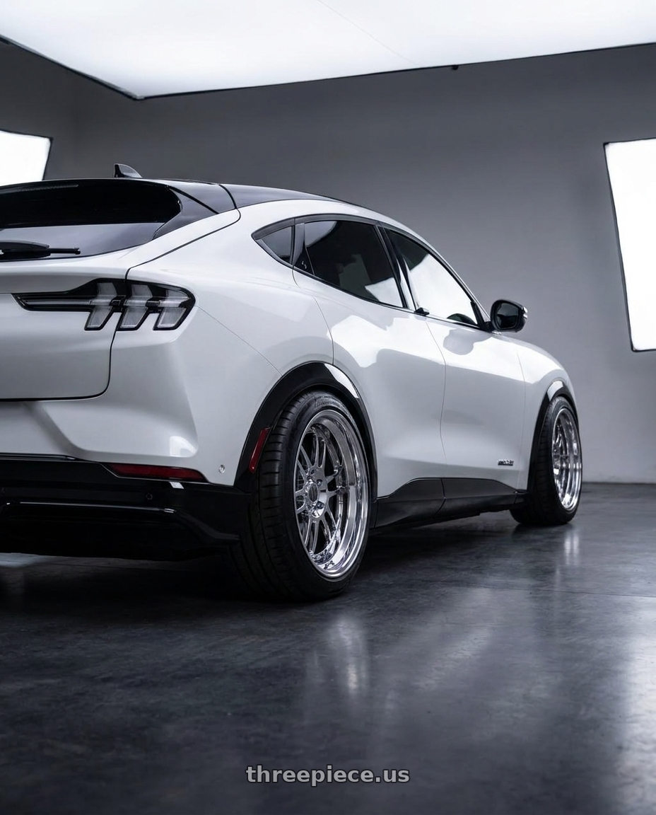 2022 ford Mustang Mach e with Heritage Wheel FORMULA wheels rear three quarter view meaty tires