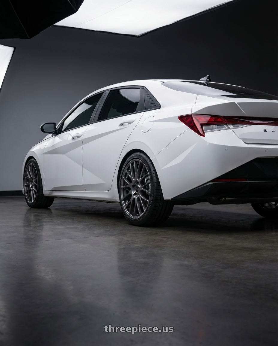 2024 Hyundai Elantra N with Ssr Gtv04 5x114.3 19×8.5x8.5+45  METALLIC GRAY wheels rear three quarter view square tires