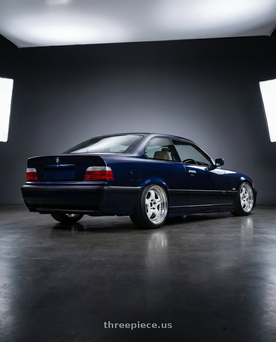 1997 BMW 328i with Work Meister S1 3P 5x120 17x8+36 W Disk White wheels rear three quarter view slight stretch tires