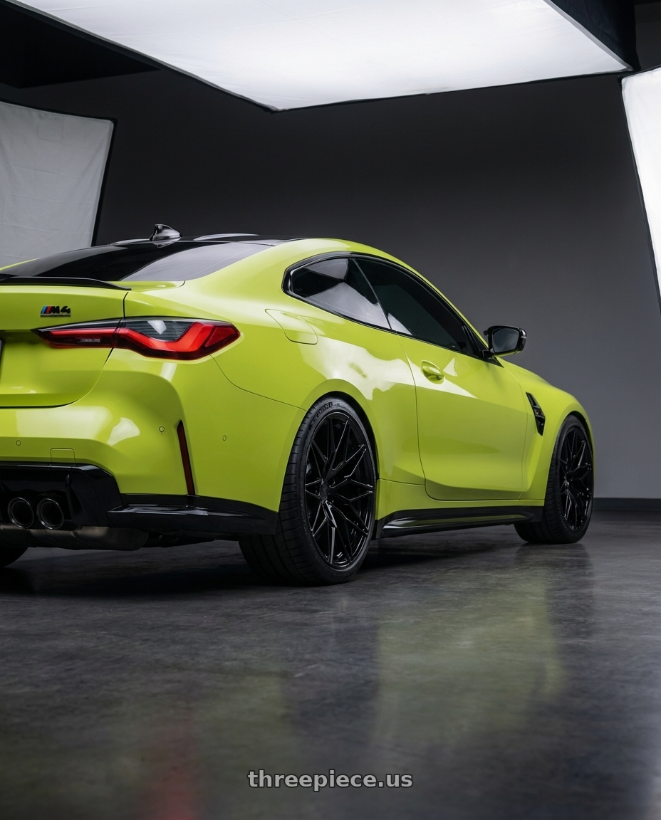 2024 BMW M4 G82 with Avant Garde Wheels M520R 5X112 19x9.5 +40 Gloss Black wheels rear three quarter view square tires