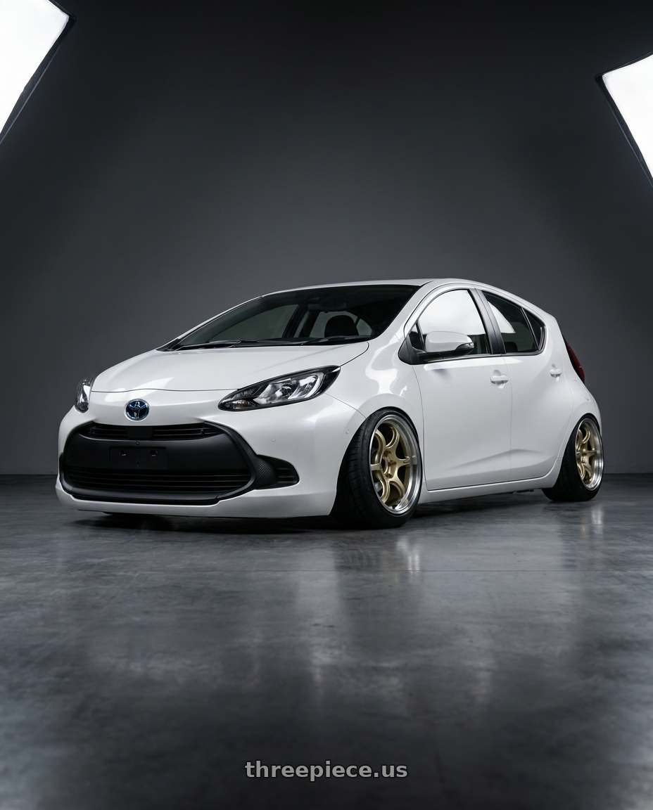 Toyota Aqua 2023 with Advan Racing RG-D2 4x100 15x7.0 +30 MACHINING & CHAMPAGNE GOLD wheels