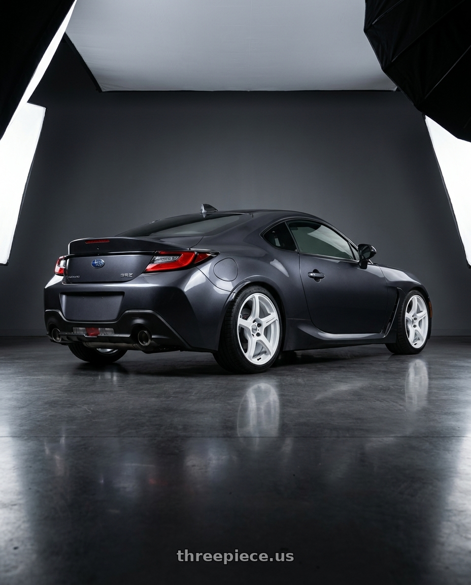 2023 Subaru BRZ premium with Work Emotion T5r 5x100 18x7.5 +48 Ice White wheels rear three quarter view square tires