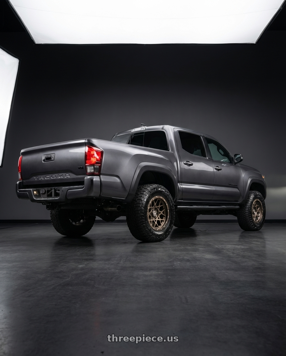 2021 Toyota Tacoma with Volk Racing RAYS M8 6x139.7 17x8.5 +0 DARK BRONZE wheels rear three quarter view meaty tires