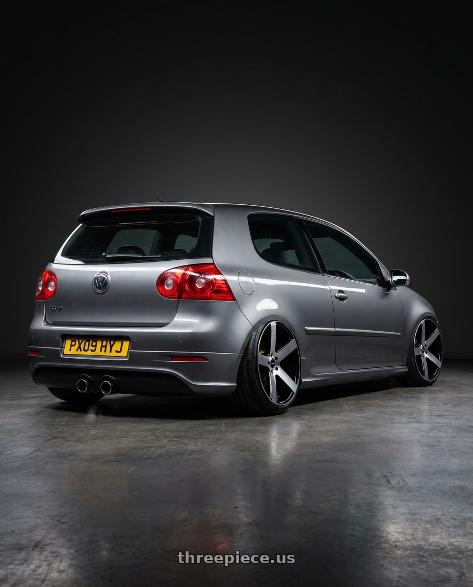 2009 VW Golf R32 with Strada Coda 5x112 20x8.5 +35 Gloss Black Machined wheels rear three quarter view extreme stretch tires