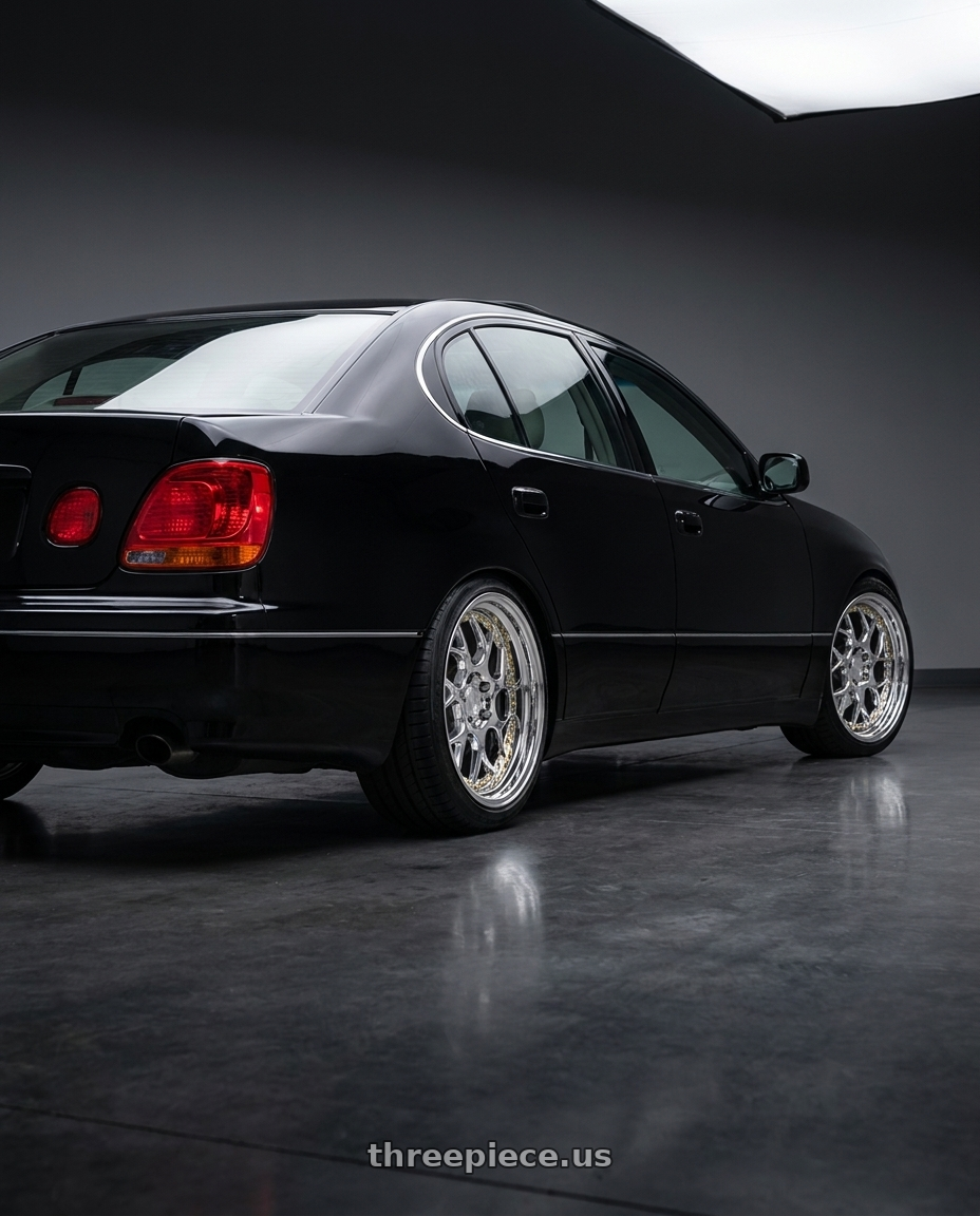 2001 Lexus GS300 with Aodhan DS01 5x114.3 18x8.5+35 Vacuum Chrome W/ Gold Rivets wheels rear three quarter view square tires