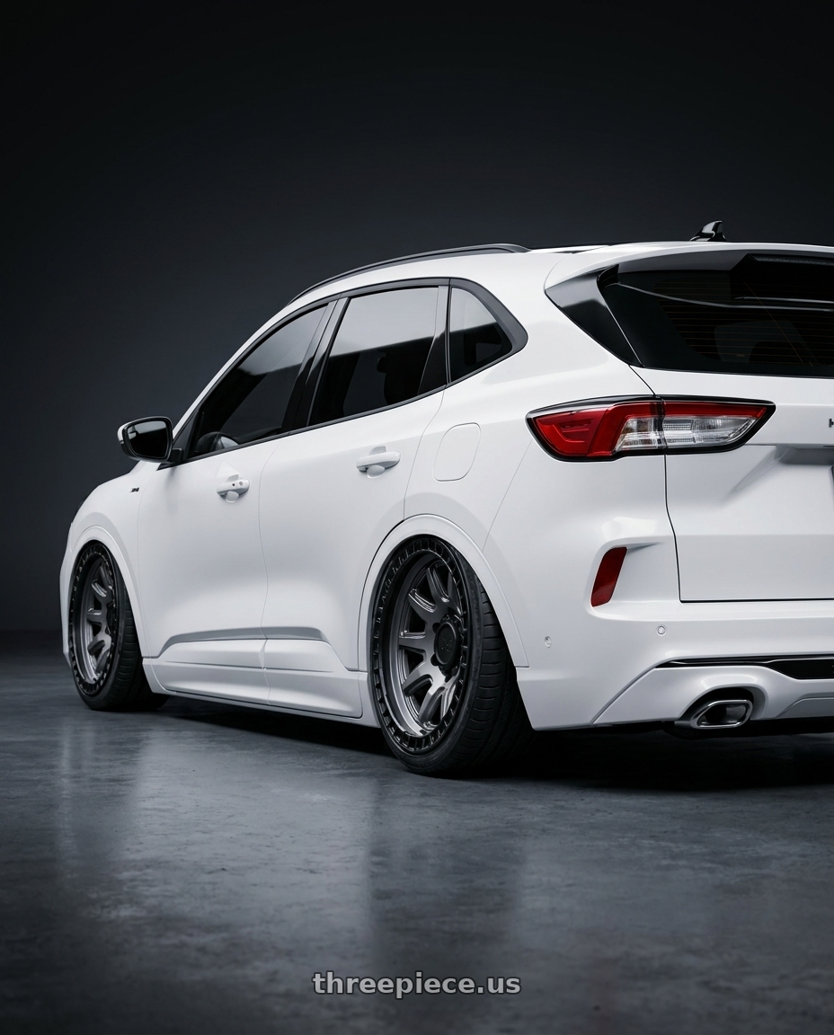 2025 ford kuga with Black Rhino CALICO 5X127 17X8.5 0 MATTE GUNMETAL W/ MATTE BLACK LIP wheels rear three quarter view extreme stretch tires