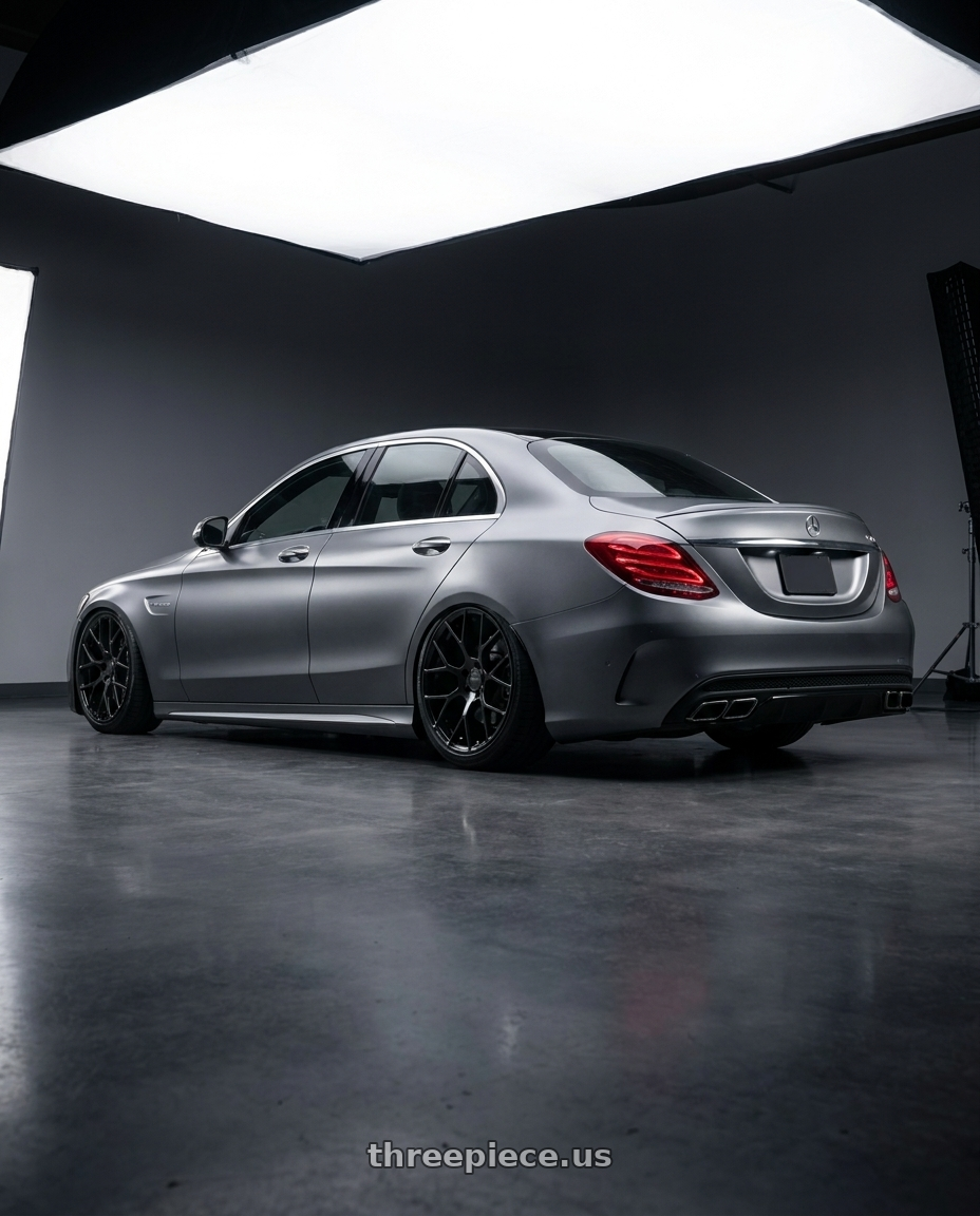 2016 Benz c63s with Petrol P2B 5X100 15X7 +40 GLOSS BLACK wheels rear three quarter view slight stretch tires