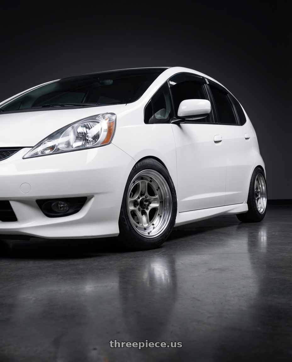 2013 Honda fit  with Work Equip 40 4x100 15x6.5 +26 o disk Brut Silver wheels