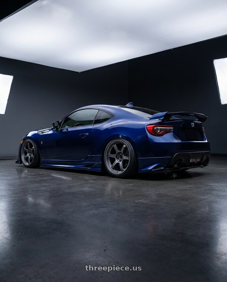2017 Toyota 86 with Gram Lights 57DR 5x100 18x8.5+37 Gunblue II wheels rear three quarter view square tires