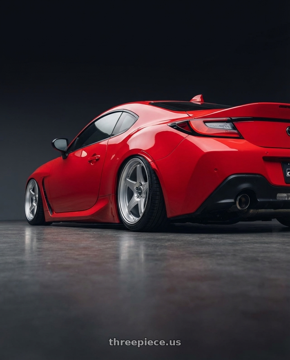 2024 Toyota GR86 with ESR Wheels APEX SERIES AP5 5x114.3 18x10.5 +22 Hyper Silver wheels rear three quarter view slight stretch tires