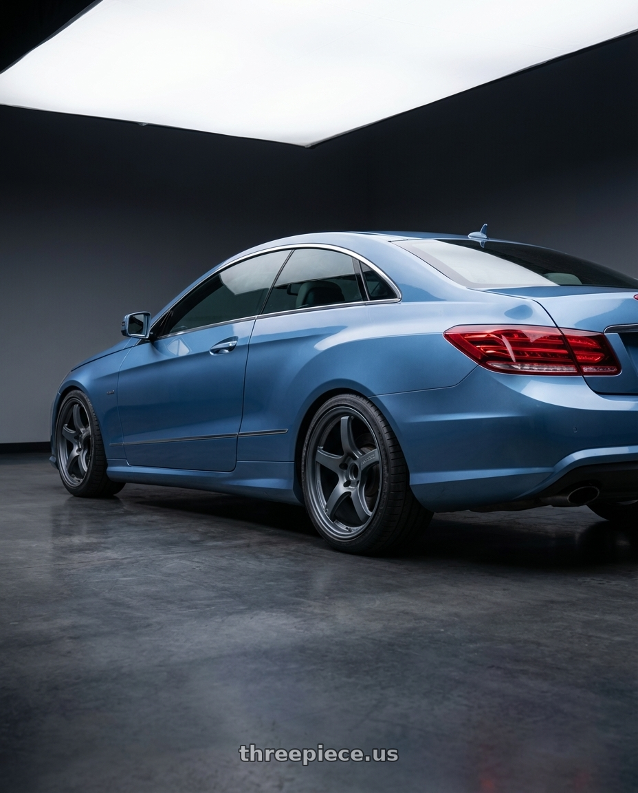 2014 Mercedes-Benz E-Class Coupe C207 with Gram Lights 57CR 5x112 19x10.5+35 Gunblue II wheels rear three quarter view square tires