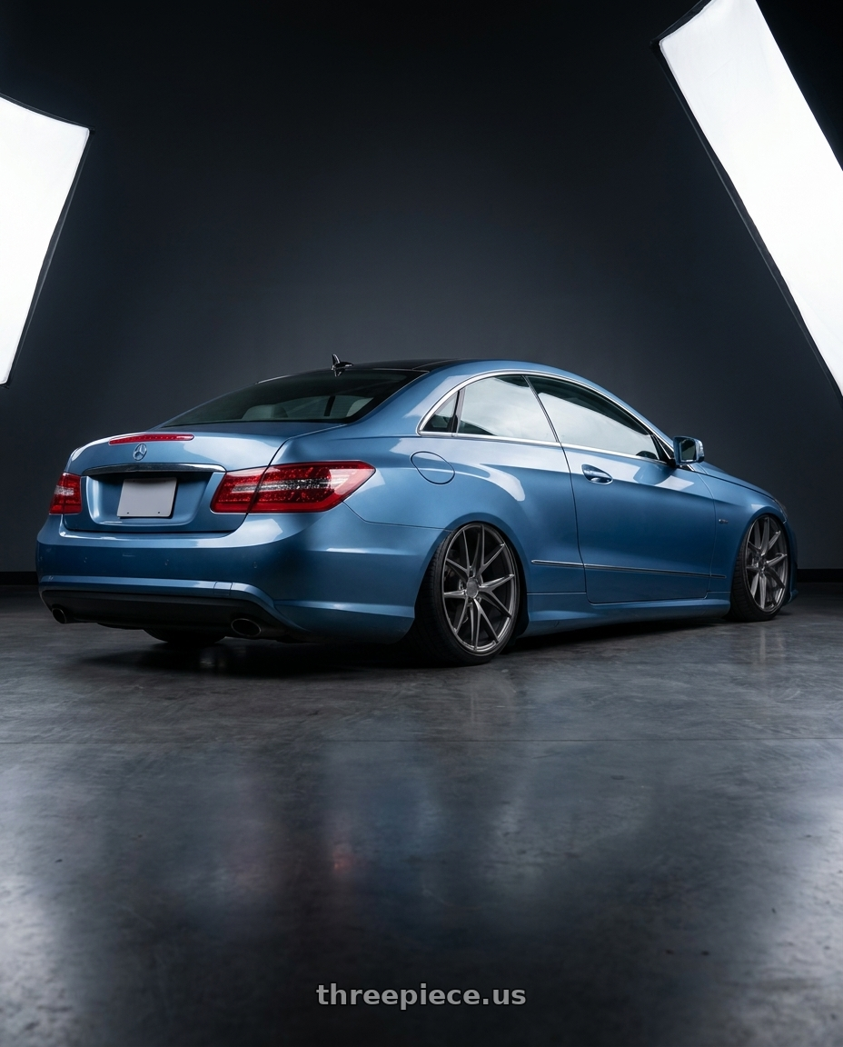 2014 Mercedes-Benz E-Class Coupe C207 with Niche 1PC M116 MISANO 5X112 20X10.5 +20 MATTE GUN METAL wheels rear three quarter view slight stretch tires