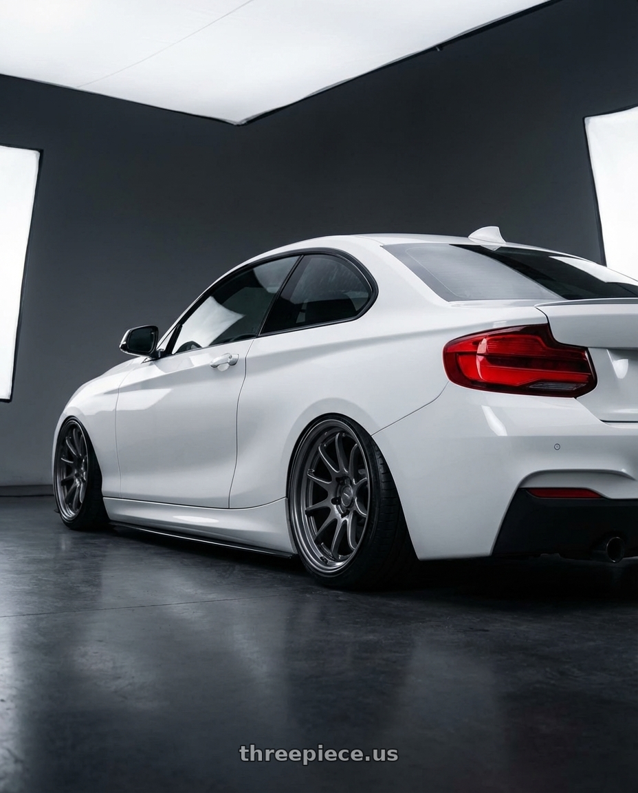 2018 BMW 2 Series F22 with Kansei K11G Tandem 5X120 19x10.5 22 Gunmetal wheels rear three quarter view slight stretch tires