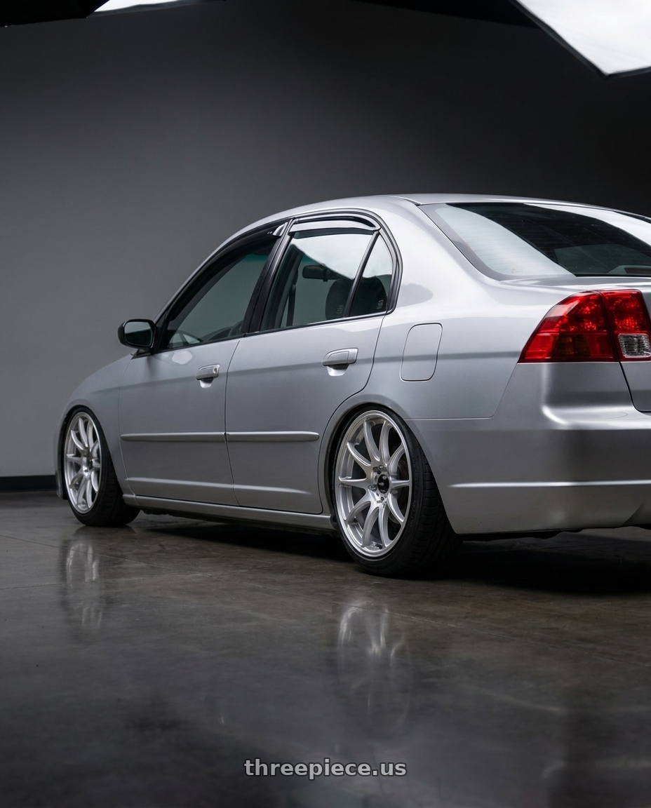 2002 Honda civic with Vors TR4 5x100 17x8  +35 Silver Machine Face wheels rear three quarter view slight stretch tires