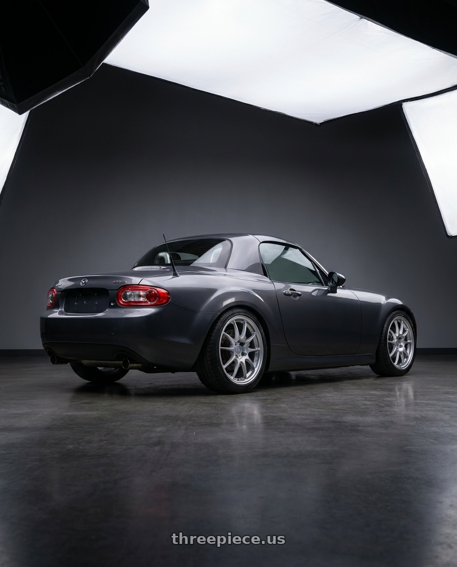 2014 Mazda Miata with Enkei PF01 5x114.3 17x7.5+38 Silver wheels rear three quarter view square tires