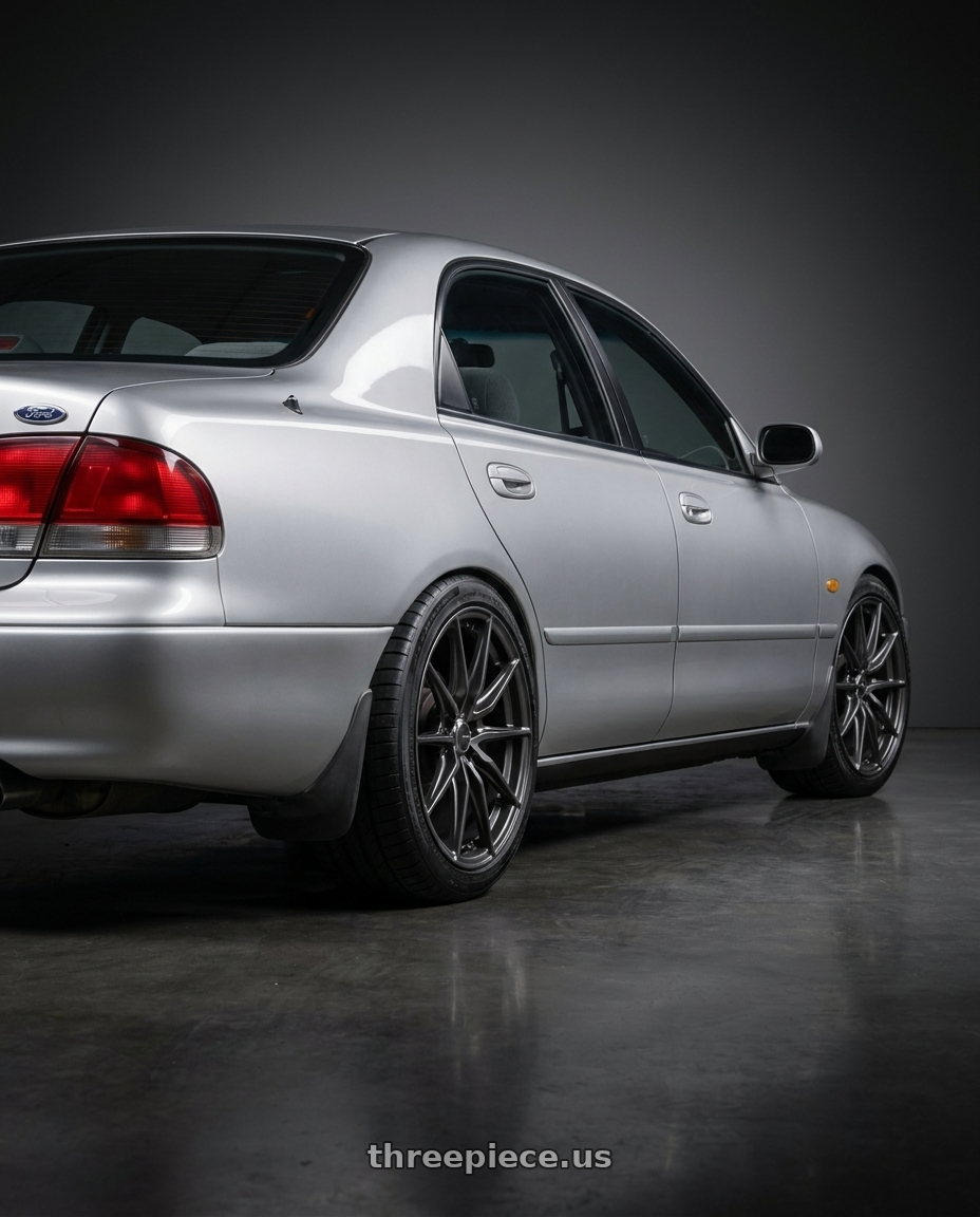 1997 Ford Telstar with Enkei DRACO 5x112 18x8.0+45 Anthracite wheels rear three quarter view square tires