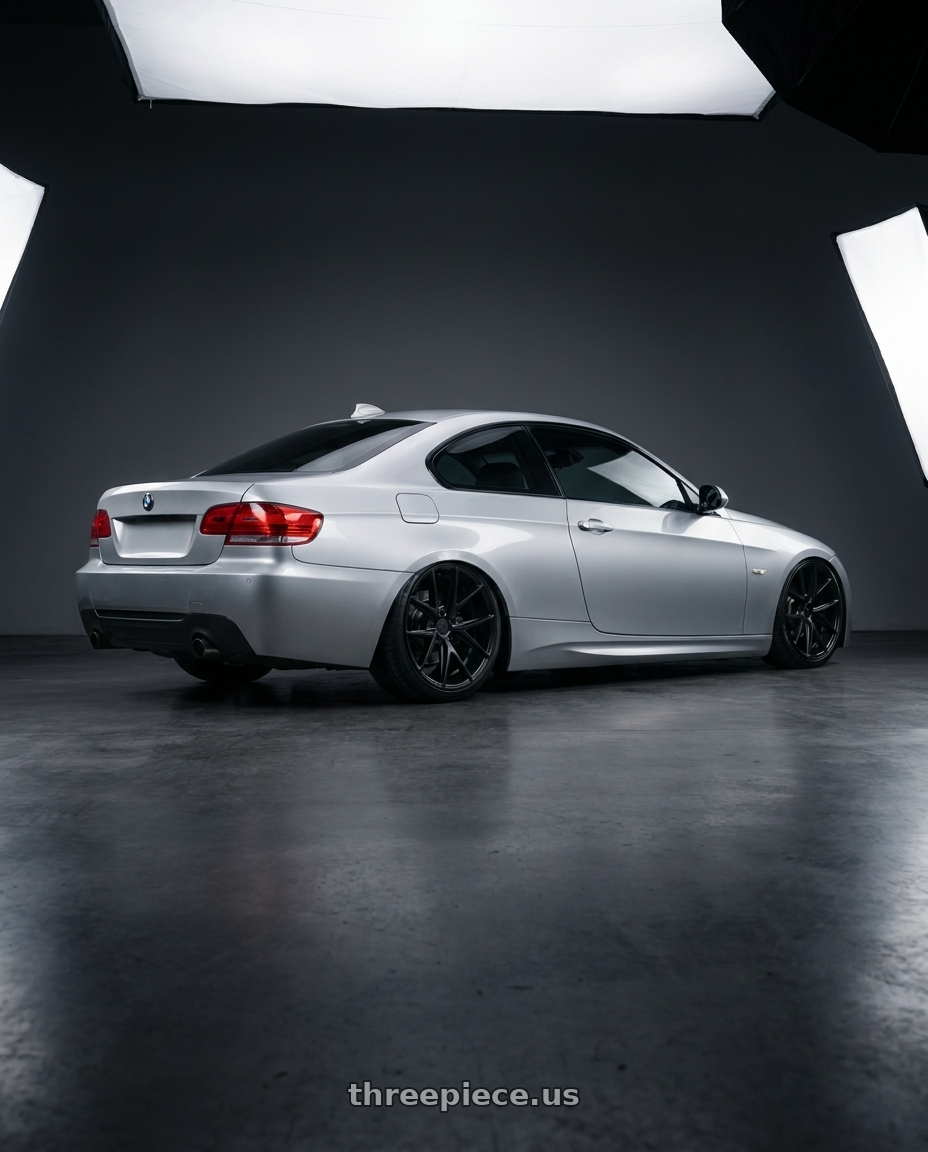 2012 BMW 3 Series E92 with Niche 1PC M117 MISANO 5X120 18X9.5 +40 MATTE BLACK wheels rear three quarter view slight stretch tires