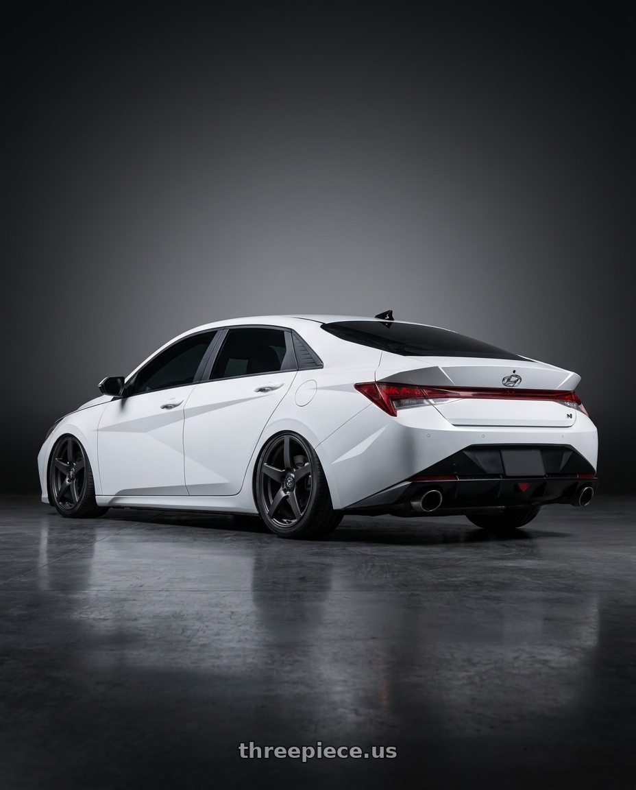 2024 Hyundai Elantra N with Forgestar CF5 5x114.3 19x9.5 +29 Satin Black wheels rear three quarter view slight stretch tires