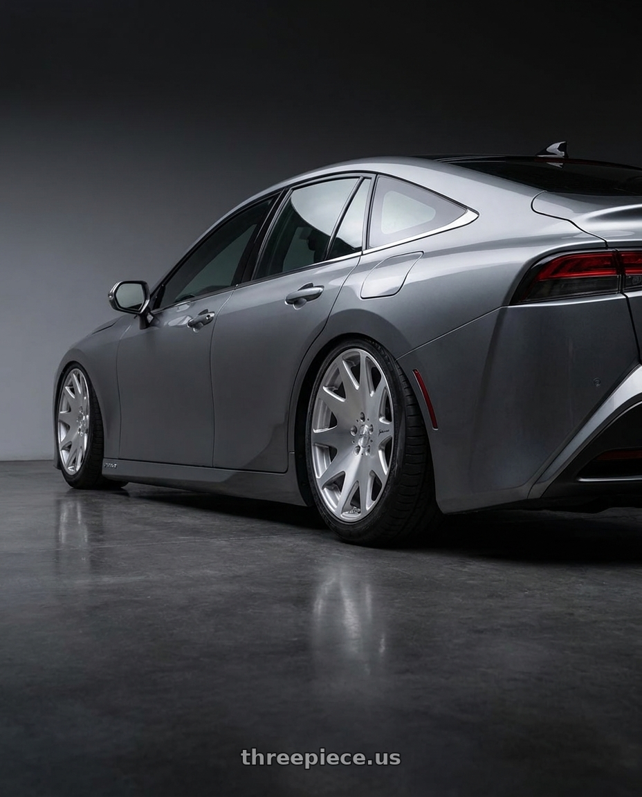 2021 Toyota mirai with MRR HR3 5x120 19x8.5 +35 Silver Machine Face wheels rear three quarter view meaty tires