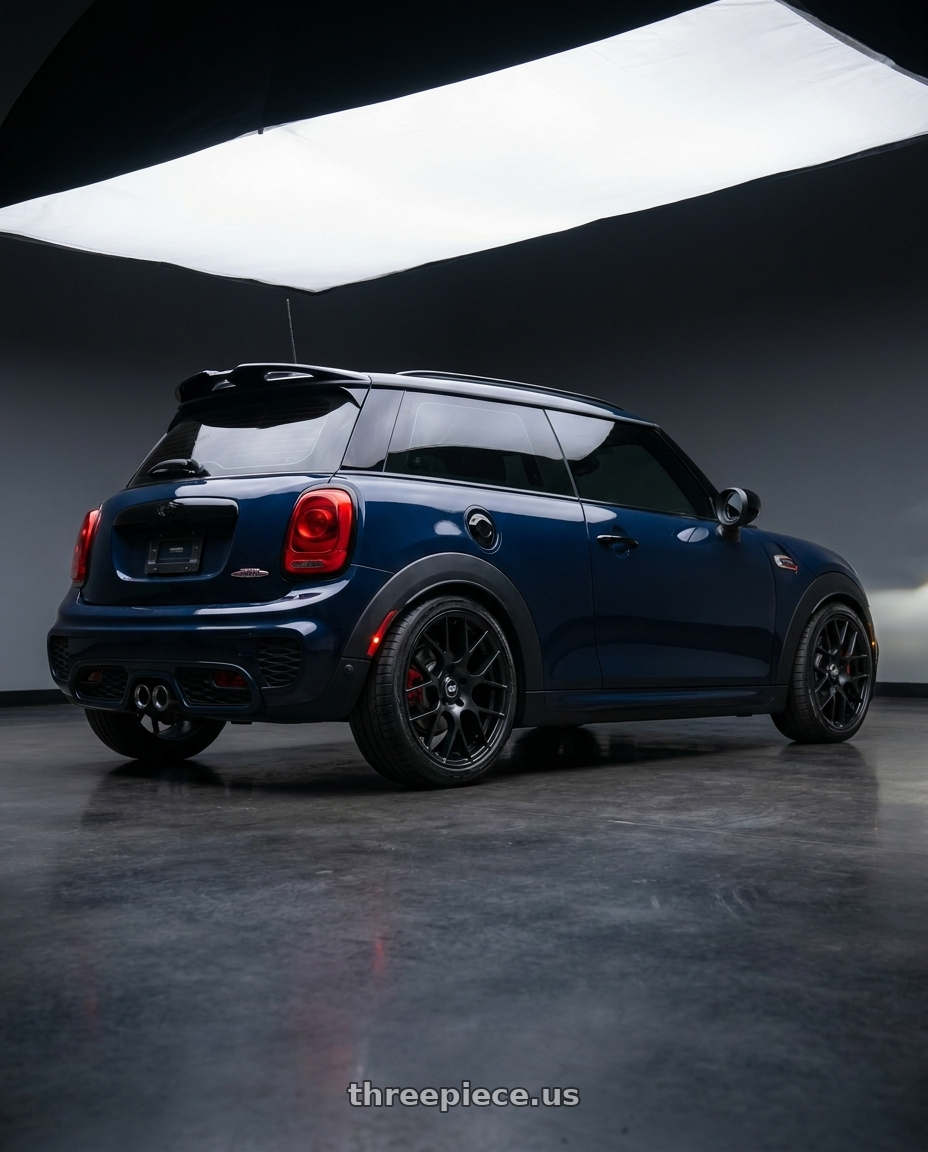 2019 Mini jcw with Enkei Raijin 5x112 18x8+45 Matte Black wheels rear three quarter view square tires