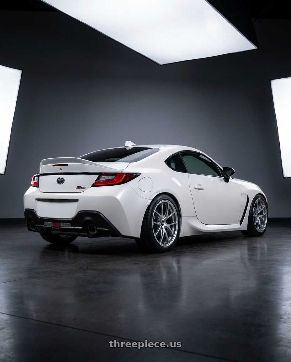 2022 Toyota GR86 with BBS RI-A 5x100 18x9.5 +45 Diamond Silver wheels rear three quarter view square tires