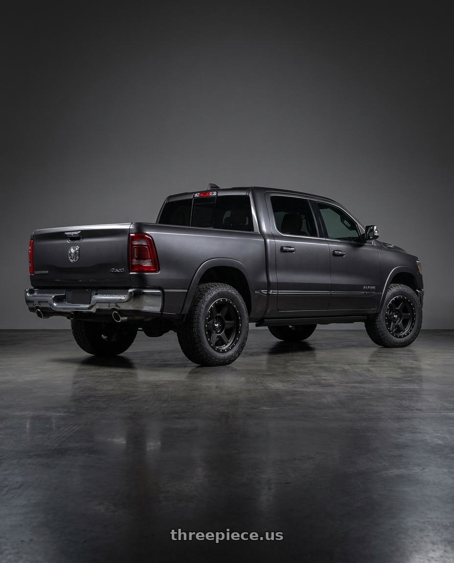2021 Ram 1500 Laramie with Dirty Life Compound 9315 6x139.7 18x9-12 Matte Black wheels rear three quarter view square tires