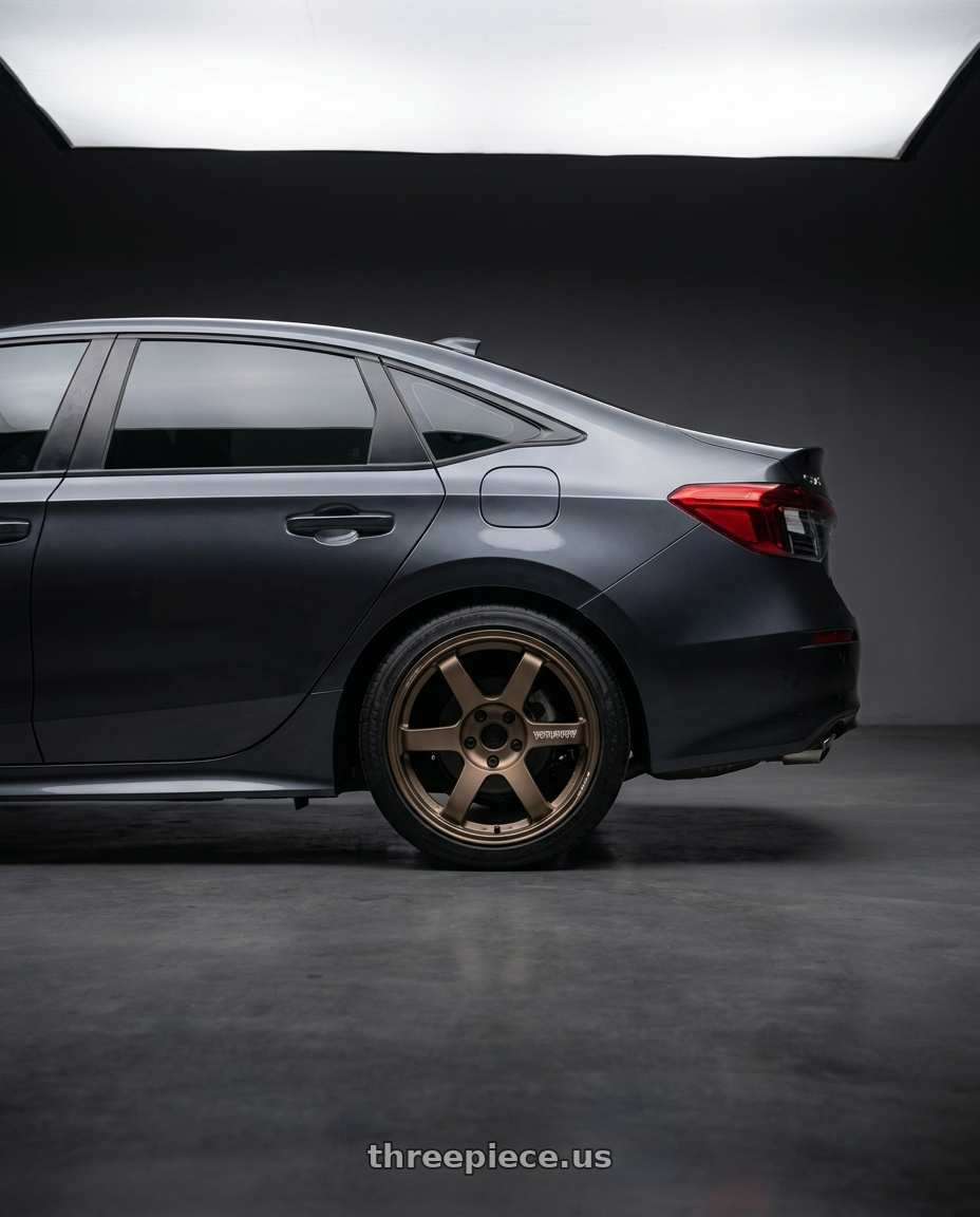 2024 honda civic with Volk Racing TE37 Saga S-Plus 5x120 18x9.5+45 Bronze wheels rear three quarter view square tires
