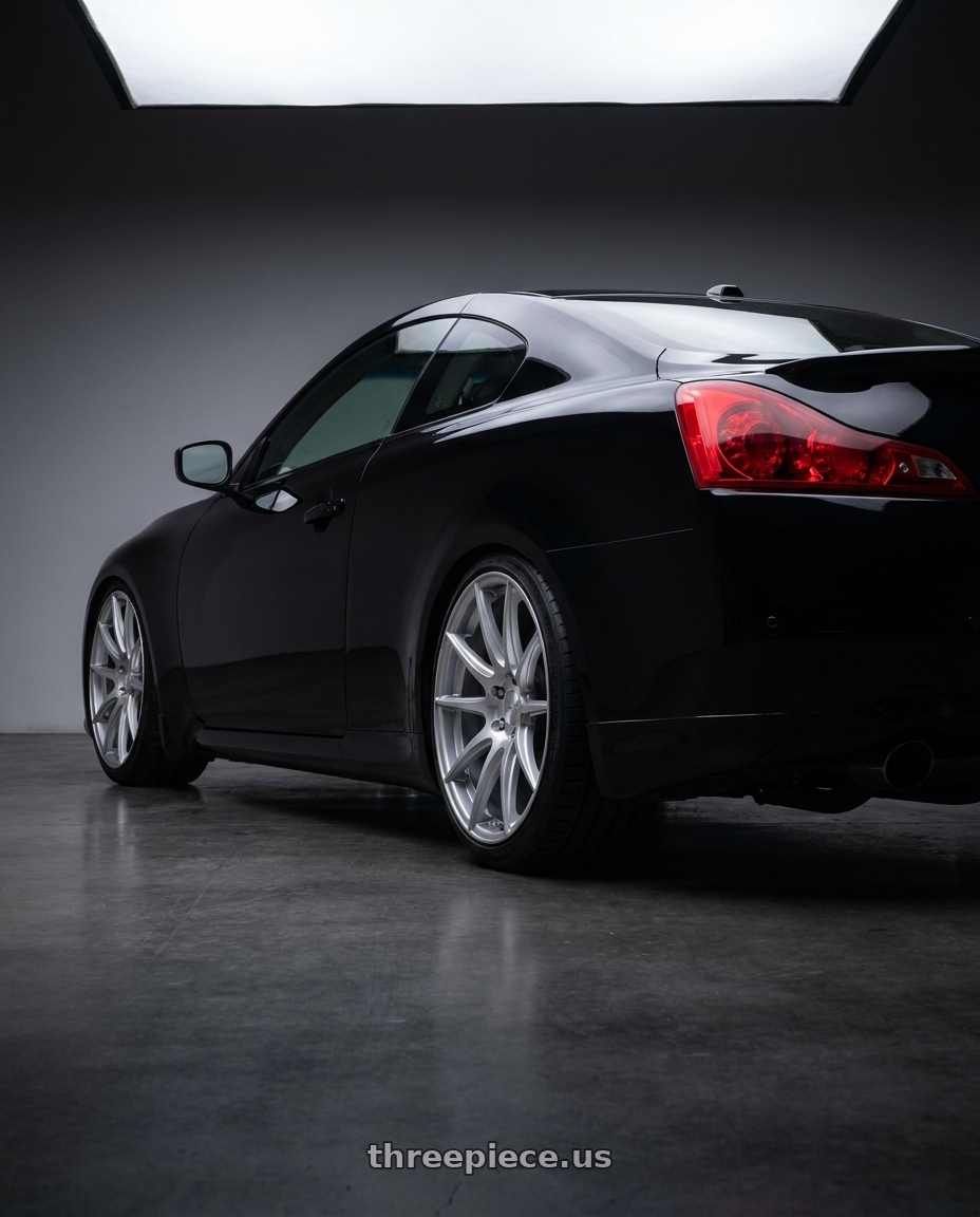 2011 INFINITI G37 with TPMS Sensor wheels rear three quarter view square tires