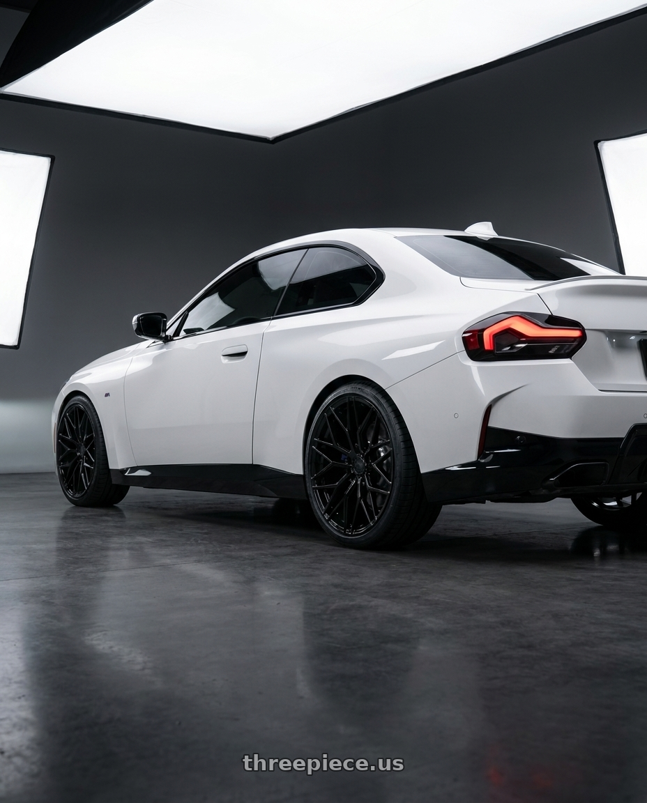 2024 BMW 2 Series G42 with Avant Garde Wheels M520R 5X112 19x9.5 +40 Gloss Black wheels rear three quarter view square tires