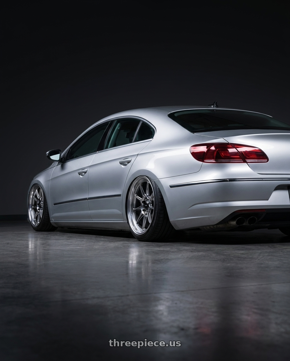 2015 Volkswagen CC with Konig Countergram 5x112 19x11+40 Hyper Chrome / Machined Lip wheels rear three quarter view slight stretch tires