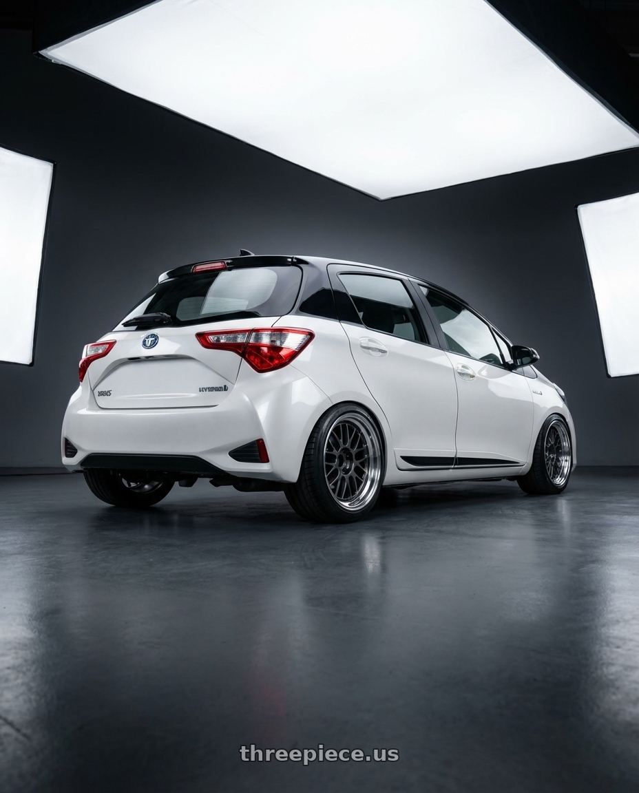2020 Toyota Yaris Y20 with Volk Racing 21A 5x120 18x9.5 +22 DARK GUNMETAL / RIM DC wheels rear three quarter view square tires