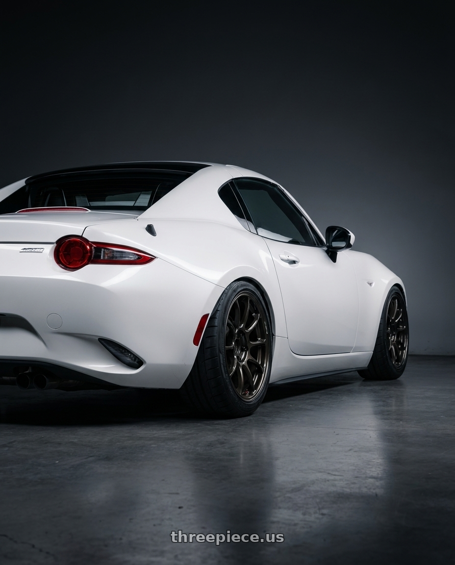 2016 MAZDA MX5 with Volk Racing ZE40 4x100 16x7.0+36 Diamond Dark Gunmetal wheels rear three quarter view meaty tires