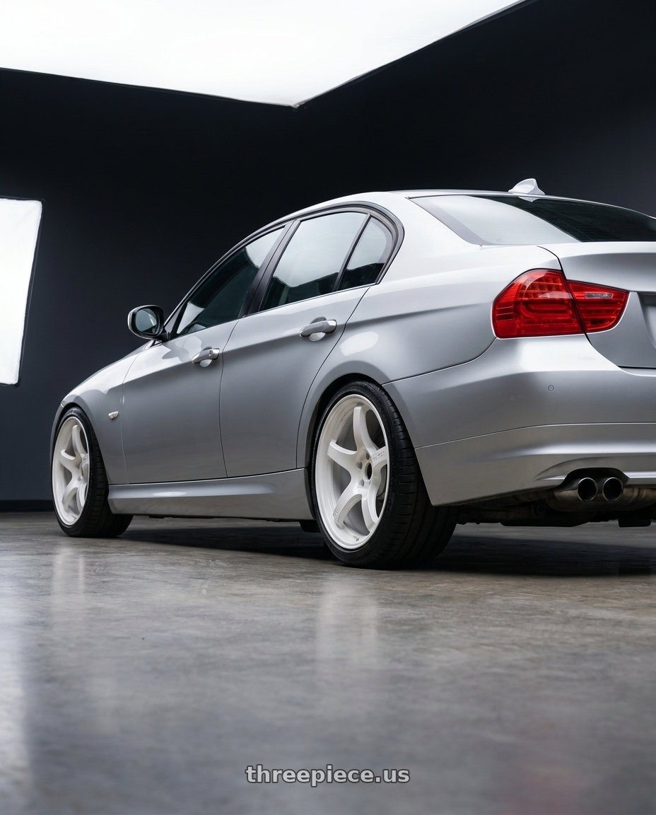 2012 BMW 3 Series E92 with Gram Lights 57CR 5x120 18x9.5+38 Ceramic Pearl wheels rear three quarter view square tires
