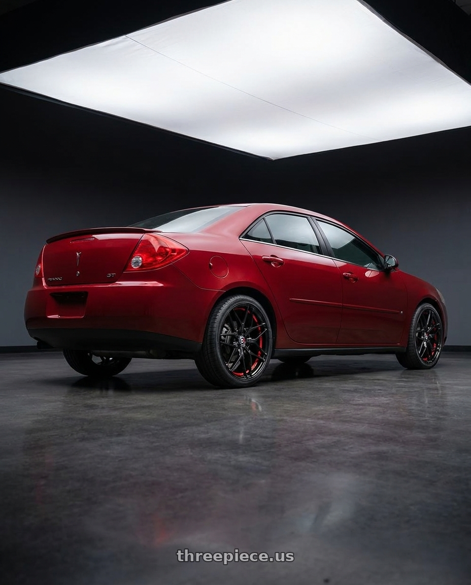 2008 Pontiac G6 GT with Spec-1 SP-60 5x110/5x114.3 18x8 +38 Gloss Black & Red Undercut wheels rear three quarter view square tires