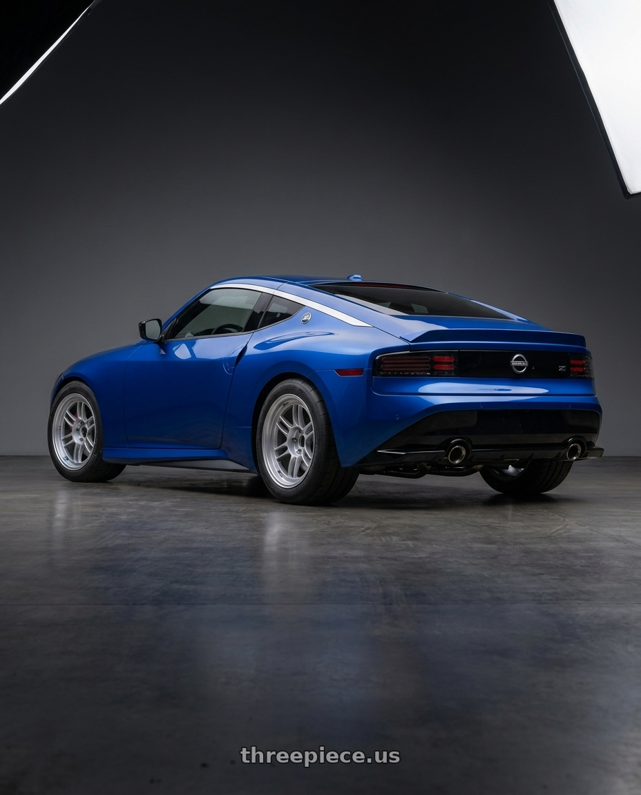 2024 Nissan Z  with Enkei RPF1RS 5x114.3 18x10.5+10 Silver wheels rear three quarter view meaty tires