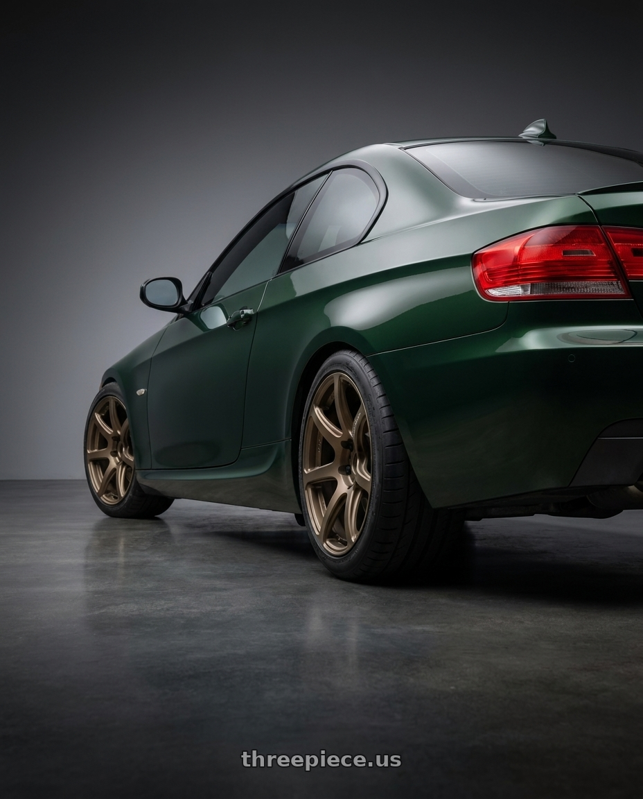 2008 BMW 335xi with Work Emotion T7r 5x120 18x9.5 +38 Matte Bronze wheels rear three quarter view meaty tires