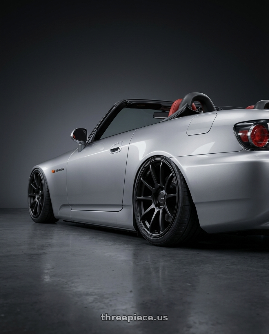 2009 Honda S2000 with Ssr Gtv02 5x114.3 18x8.5+40  FLAT BLACK wheels rear three quarter view slight stretch tires