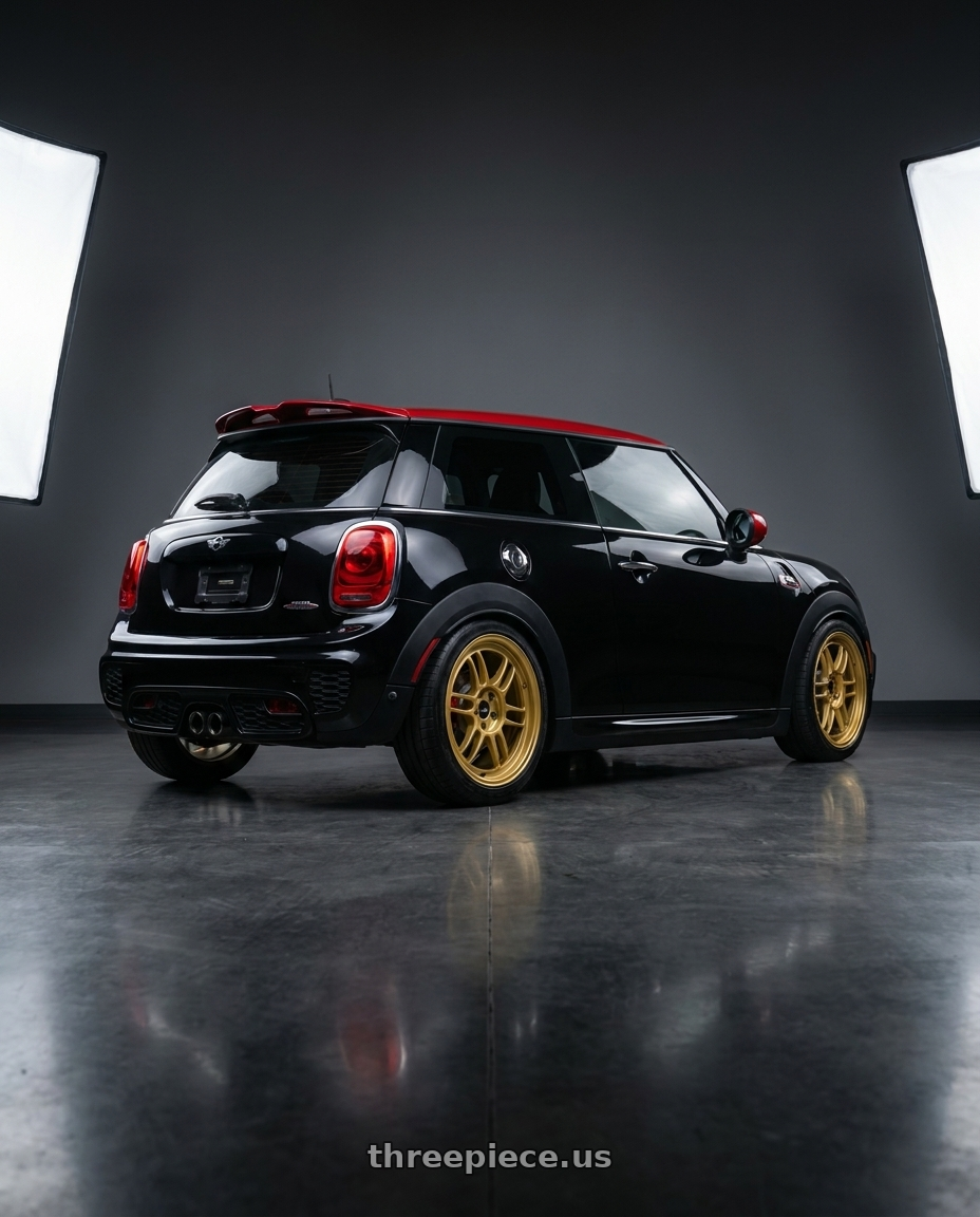 2017 mini John cooper works with Enkei RPF1 5x100 18x8+45 Gold wheels rear three quarter view slight stretch tires