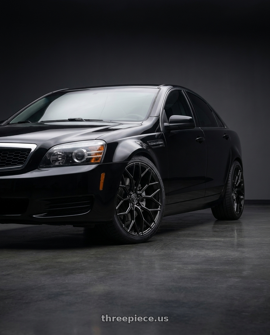 2014 Chevrolet Caprice PPV with DOLCE PERFORMANCE PISTA 5x120 19x9.5 +40 Gloss Black wheels front three quarter view stock stance