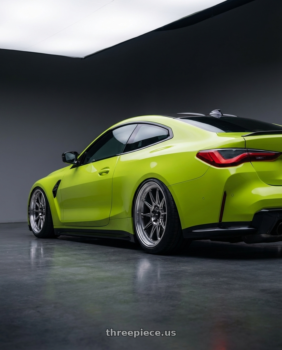 2024 BMW M4 G82 with Konig Countergram 5x112 19x11+40 Hyper Chrome / Machined Lip wheels rear three quarter view slight stretch tires