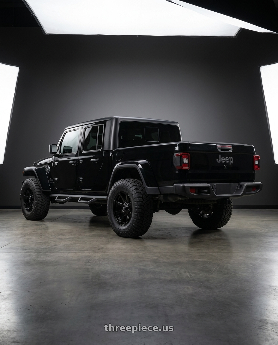 2021 jeep gladiator with Fuel 1PC D575 COUPLER 5X114.3/5X127 20X10 -12 GLOSS BLACK wheels rear three quarter view meaty tires