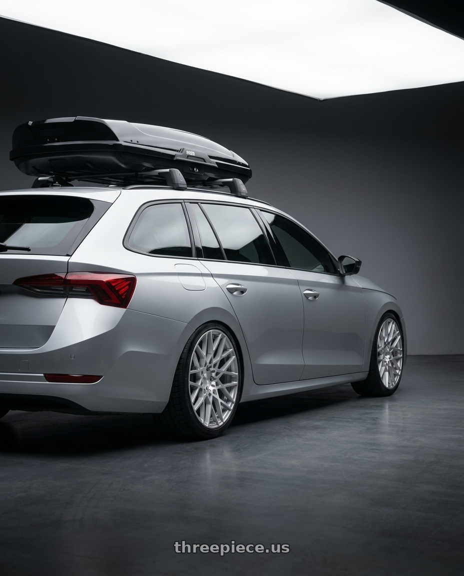 2022 Škoda Octavia combi with Rotiform 1PC R110 BLQ 5X112 19X8.5 +35 GLOSS SILVER MACHINED wheels rear three quarter view square tires