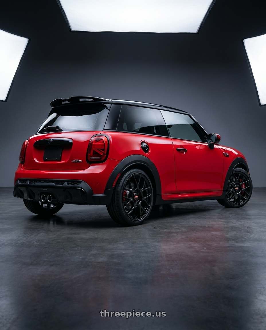 2025 mini jcw with BBS XR 5x112 18x8.0+44 Gloss Black wheels rear three quarter view square tires