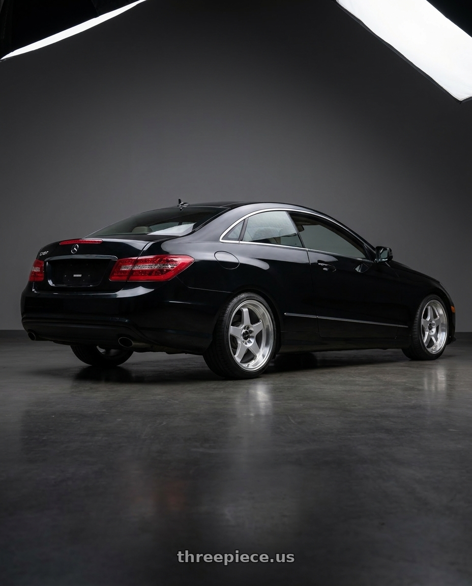 2013 Mercedes-Benz E350 4Matic with Vors SP1 5x112 17x9  +30 Silver Machine Face Lip wheels rear three quarter view square tires