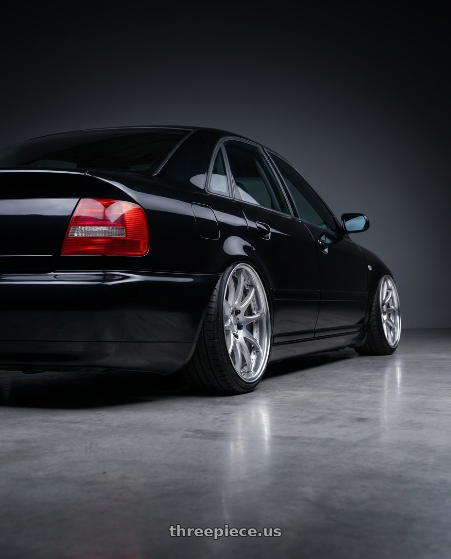 2001 audi a4 with Work Emotion Cr 3P 5x112 18x8.5+20 R Disk Burning Silver wheels rear three quarter view slight stretch tires