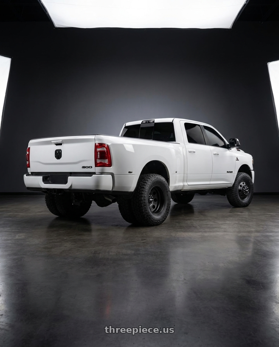 2025 ram 3600 with American Racing AR204 BAJA DUALLY 8X165.1 16X6 +111 SATIN BLACK - FRONT wheels rear three quarter view meaty tires