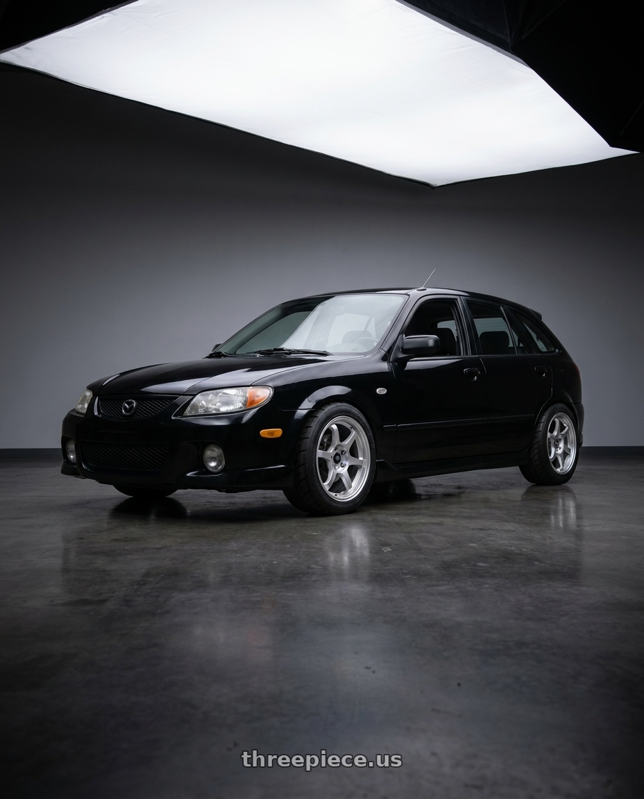2002 Mazda Protege5 with MST Wheels MT40 5X114.3 16x7.0 +38 Glossy Silver wheels